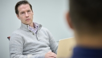 Trainee listening to a classmate